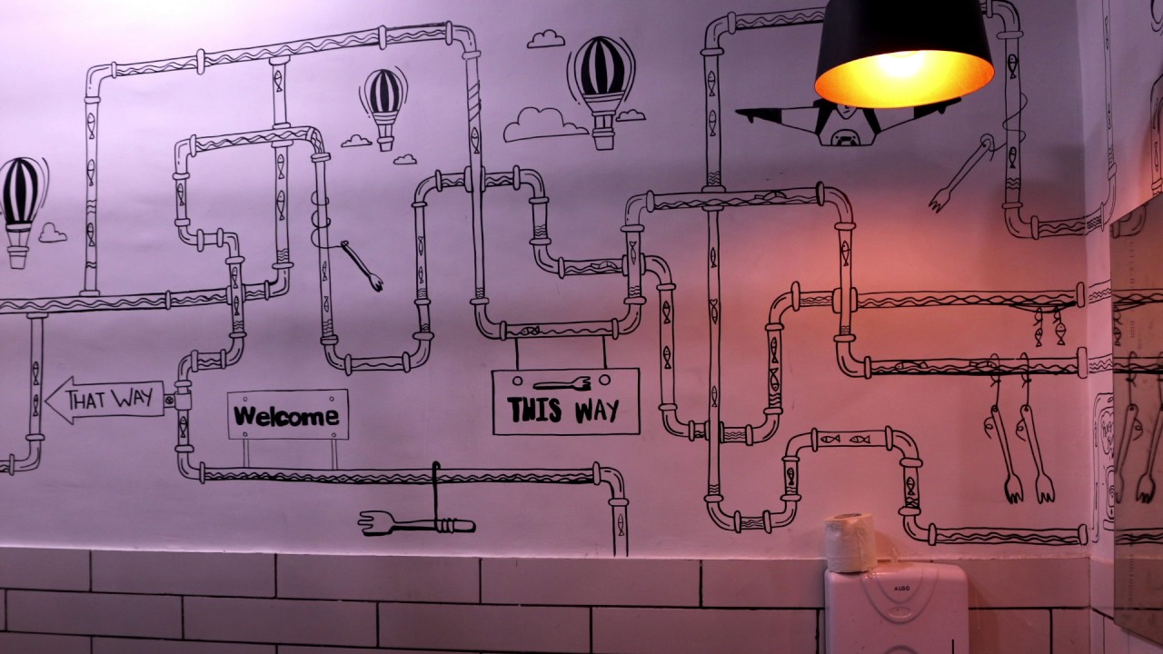 Womens Bathroom wall doodles Fork Media